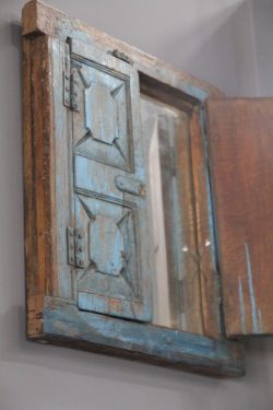 Wooden window with mirror