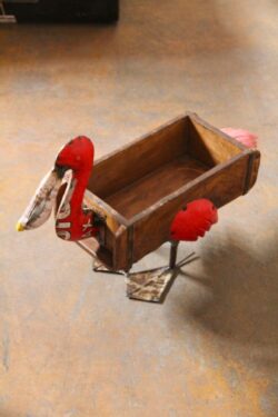 Wooden brick with iron pelican accent