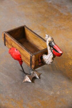 Wooden brick with iron pelican kilangi accent