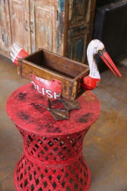 Wooden brick with iron long beak bird