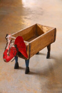 Wooden brick with iron elephant